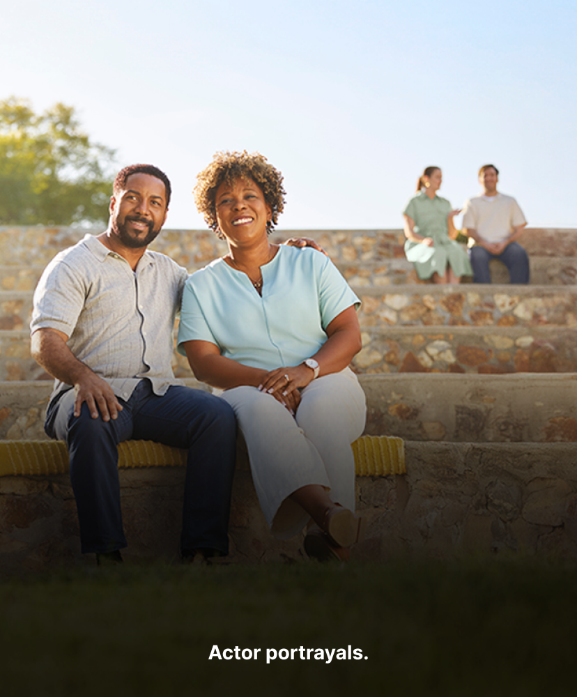 People sitting on stone steps. Actor portrayals.