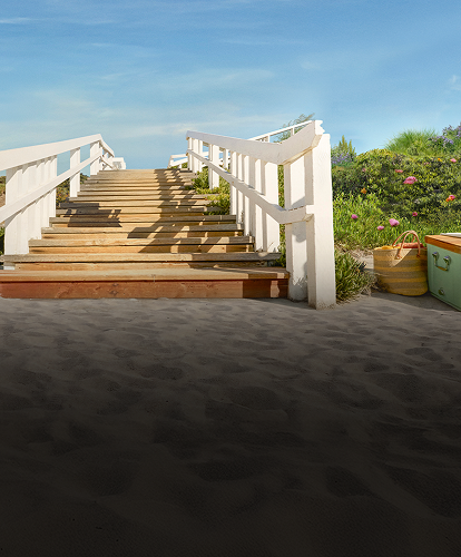 Idyllic beach scene with walking path to ocean