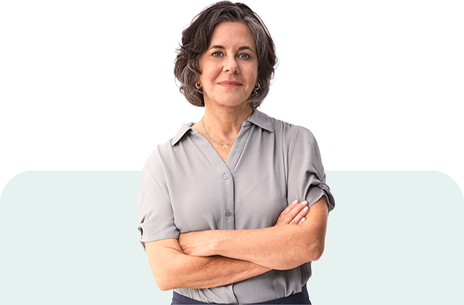Sara standing with arms crossed