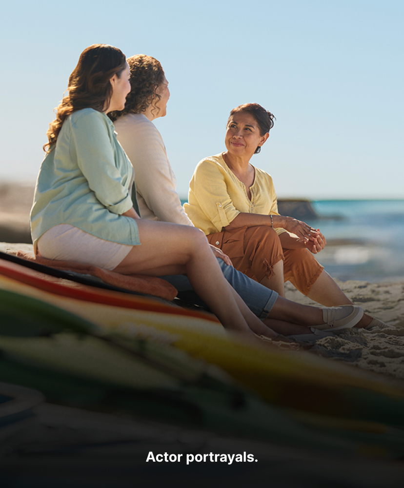 Family at beach. Actor portrayals.